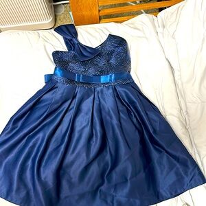 Satin and cotton dress.The dress has very comfortable material.Lining is soft.